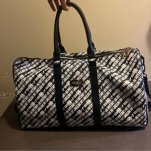 Hitman Hustler Traveler duffel bag a signature all-over print